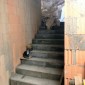 Vom Untergeschoss eine Treppe zur Kirche